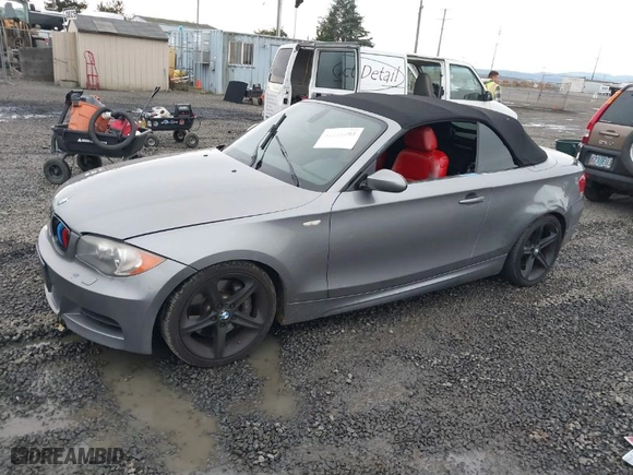 2009 BMW 1 Series 135i with VIN WBAUN93599VK40515, listed as a IAAI auction lot 41144493 with 161,676 mi miles. Bid and sale history available at carsss.com. Image 2.