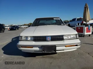 1996 Oldsmobile Cutlass Ciera 1SA VX5 z VIN 1G3AJ55M2T6364559, wystawiony jako Copart lot #81648814 z przebiegiem 243 363 mil mil oraz Tytuł czysty. Historia ofert i sprzedaży dostępna na DreamBid. Obrazek 5.