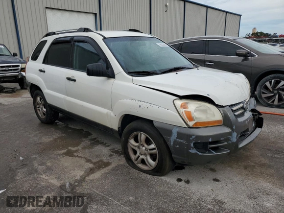 2005 Kia Sportage LX with VIN KNDJF723557078730, listed as a Copart auction lot 79823504 with 166,509 mi miles and Salvage Title. Bid and sale history available at carsss.com. Image 4.