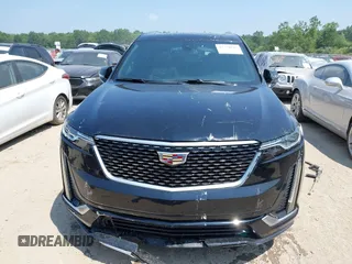 2021 Cadillac XT6 Premium Luxury with VIN 1GYKPDRS0MZ153523, listed as a IAAI auction lot 42770895 with 19,843 mi miles and . Bid and sale history available at DreamBid. Image 12.