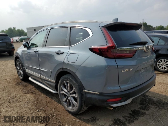 2020 Honda CR-V Touring z VIN 2HKRW2H9XLH236764, wystawiony jako Copart lot #59693475 z przebiegiem Nie podano mil oraz Czysty tytuł • Clean title. Historia ofert i sprzedaży dostępna na DreamBid. Obrazek 2.