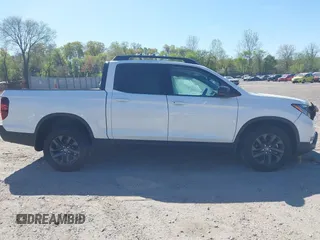 2024 Honda Ridgeline Sport z VIN 5FPYK3F11RB005065, wystawiony jako IAAI lot #42133517 z przebiegiem 4 697 mil mil oraz . Historia ofert i sprzedaży dostępna na DreamBid. Obrazek 14.