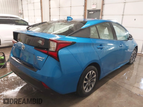 2021 Toyota Prius L Eco with VIN JTDKAMFU9M3135117, listed as a IAAI auction lot 41579736 with 35,795 mi miles and . Bid and sale history available at DreamBid. Image 4.