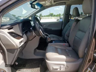 2015 Toyota Sienna XLE with VIN 5TDYK3DC4FS629558, listed as a Copart auction lot 64062045 with 172,669 mi miles and Clean title. Bid and sale history available at DreamBid. Image 7.
