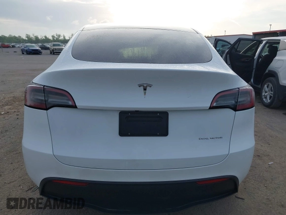 2023 Tesla Model Y Long Range with VIN 7SAYGDEE4PF770307, listed as a IAAI auction lot 42141175 with 34,901 mi miles and . Bid and sale history available at carsss.com. Image 17.