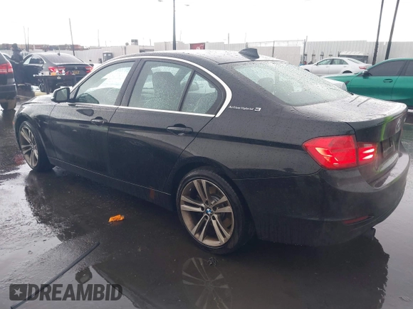 2013 BMW 3 Series ActiveHybrid 3 with VIN WBA3F9C57DF483994, listed as a IAAI auction lot 41797778 with 92,313 mi miles. Bid and sale history available at carsss.com. Image 3.