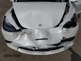 2023 Tesla Model 3 Long Range with VIN 5YJ3E1EB1PF603100, listed as a Copart auction lot 54945865 with 22,865 mi miles and Salvage Title. Bid and sale history available at DreamBid. Image 11.