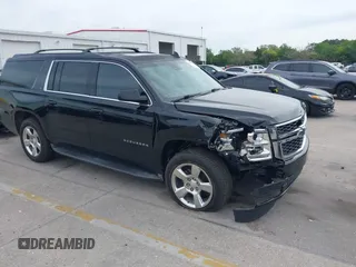 2016 Chevrolet Suburban LT z VIN 1GNSCHKCXGR384596, wystawiony jako IAAI lot #41869473 z przebiegiem 14 700 mil mil oraz . Historia ofert i sprzedaży dostępna na DreamBid. Obrazek 1.