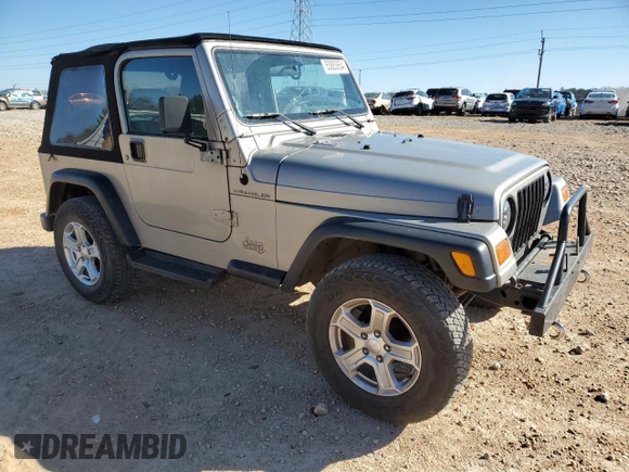 2001 Jeep Wrangler SE with VIN 1J4FA29P11P334902, listed as a Copart auction lot 83883654 with 157,827 mi miles and Salvage Title. Bid and sale history available at carsss.com. Image 4.