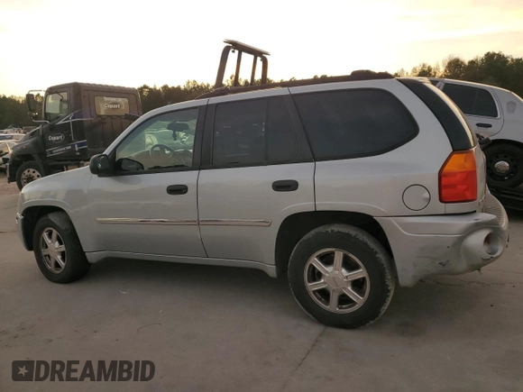 2008 GMC Envoy SLE1 with VIN 1GKDS13S282122684, listed as a Copart auction lot 80488104 with 262,167 mi miles and Salvage Title. Bid and sale history available at DreamBid. Image 2.