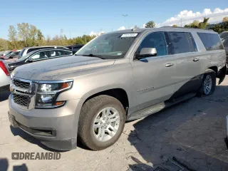 2018 Chevrolet Suburban LS with VIN 1GNSKGEC8JR390719, listed as a Copart auction lot 77217534 with 83,356 mi miles and Salvage Title. Bid and sale history available at DreamBid. Image 1.
