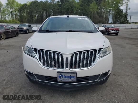 2013 Lincoln MKX with VIN 2LMDJ6JKXDBL12879, listed as a Copart auction lot 51145175 with 128,142 mi miles and Salvage Title. Bid and sale history available at carsss.com. Image 5.