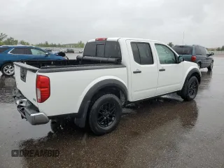2018 Nissan Frontier SV with VIN 1N6AD0EV5JN744725, listed as a Copart auction lot 57601215 with 61,718 mi miles and Salvage title. Bid and sale history available at DreamBid. Image 3.