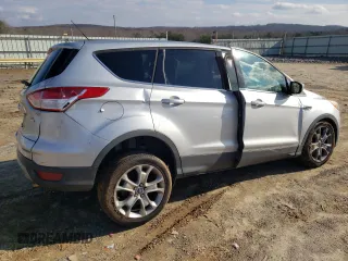 2013 Ford Escape SEL with VIN 1FMCU9HX7DUA60178, listed as a Copart auction lot 85203234 with 144,153 mi miles and Salvage Title. Bid and sale history available at carsss.com. Image 3.
