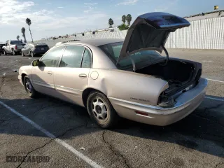 1999 Buick Park Avenue with VIN 1G4CW52K6X4653731, listed as a Copart auction lot 72736444 with 128,471 mi miles and Salvage Title. Bid and sale history available at carsss.com. Image 2.