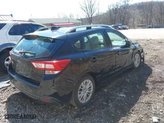 2017 Subaru Impreza Premium with VIN 4S3GTAD65H3716428, listed as a IAAI auction lot 41942299 with 77,181 mi miles. Bid and sale history available at carsss.com. Image 4.