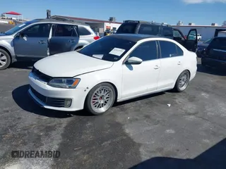 2014 Volkswagen Jetta GLI Autobahn with VIN 3VW5T7AJ8EM367002, listed as a IAAI auction lot 42032055 with 186,301 mi miles and . Bid and sale history available at DreamBid. Image 18.