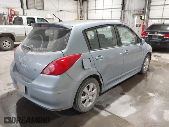 2009 Nissan Versa 1.8 SL with VIN 3N1BC13E29L392172, listed as a IAAI auction lot 41728520 with 170,832 mi miles. Bid and sale history available at carsss.com. Image 4.