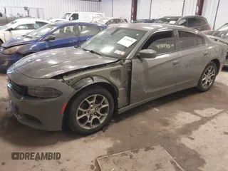 2017 Dodge Charger SXT with VIN 2C3CDXJG9HH505746, listed as a IAAI auction lot 41331990 with 180,489 mi miles and . Bid and sale history available at carsss.com. Image 2.