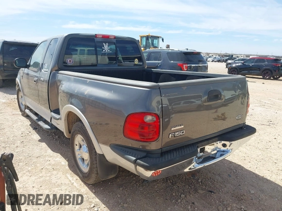 2002 Ford F-150 XL with VIN 1FTRX07L92KC81256, listed as a IAAI auction lot 41765831 with 149,506 mi miles. Bid and sale history available at carsss.com. Image 3.