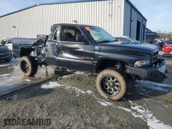1999 Dodge 1500 with VIN 1B7HF13Z1XJ622564, listed as a Copart auction lot 42615515 with 242,904 mi miles and Salvage title. Bid and sale history available at DreamBid. Image 4.
