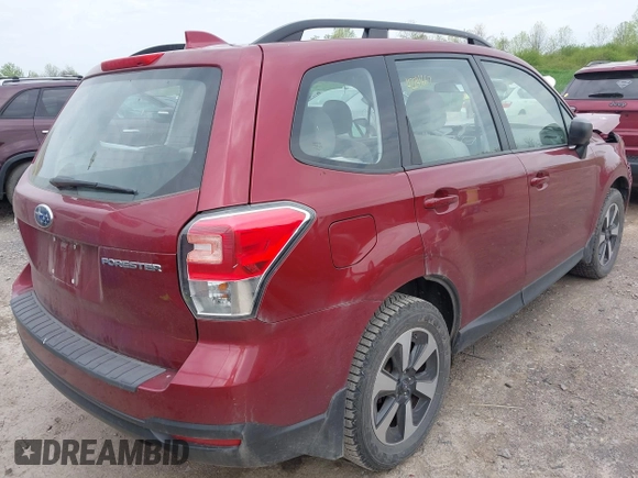 2018 Subaru Forester with VIN JF2SJABC2JH449249, listed as a IAAI auction lot 42241667 with 71,876 mi miles and . Bid and sale history available at DreamBid. Image 4.
