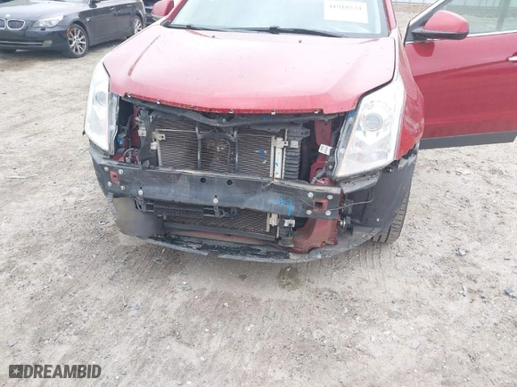 2012 Cadillac SRX Performance Collection with VIN 3GYFNBE36CS527333, listed as a IAAI auction lot 41910224 with 144,446 mi miles. Bid and sale history available at carsss.com. Image 6.