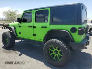 2018 Jeep Wrangler Unlimited Sport with VIN 1C4HJXDG7JW115516, listed as a Copart auction lot 58231735 with 52,992 mi miles and Salvage title. Bid and sale history available at DreamBid. Image 2.