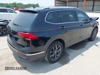 2023 Volkswagen Tiguan SE with VIN 3VVNB7AX5PM017938, listed as a IAAI auction lot 42453818 with 177,906 mi miles and . Bid and sale history available at DreamBid. Image 4.