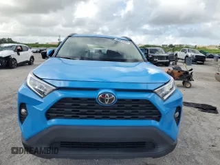 2021 Toyota RAV4 XLE with VIN 2T3W1RFV8MW118944, listed as a Copart auction lot 60824465 with 98,090 mi miles and Salvage title. Bid and sale history available at DreamBid. Image 5.