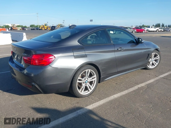 2014 BMW 4 Series 428i with VIN WBA3N7C57EK220498, listed as a IAAI auction lot 42608688 with 157,523 mi miles and . Bid and sale history available at DreamBid. Image 4.