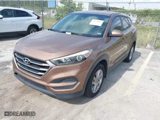 2016 Hyundai Tucson SE with VIN KM8J23A4XGU180300, listed as a IAAI auction lot 42123067 with 123,804 mi miles. Bid and sale history available at carsss.com. Image 17.