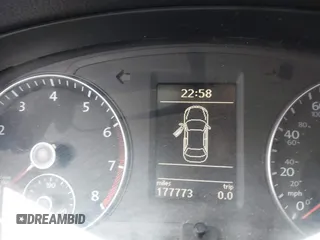 2012 Volkswagen Passat SE z VIN 1VWBP7A33CC040949, wystawiony jako IAAI lot #42306574 z przebiegiem 177 773 mil mil oraz . Historia ofert i sprzedaży dostępna na DreamBid. Obrazek 7.