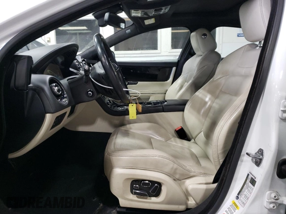 2015 Jaguar XJ with VIN SAJWJ1CD3F8V89374, listed as a Copart auction lot 49416114 with 94,636 mi miles and . Bid and sale history available at DreamBid. Image 7.