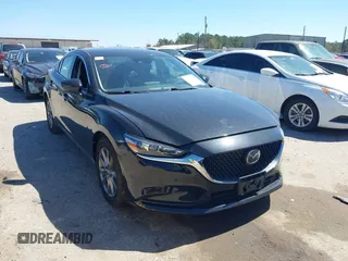 2020 Mazda 6 Sport with VIN JM1GL1UM2L1519932, listed as a IAAI auction lot 41712367 with 83,497 mi miles and . Bid and sale history available at DreamBid. Image 1.