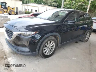 2016 Mazda CX-9 Sport z VIN JM3TCBBY6G0102634, wystawiony jako Copart lot #61077895 z przebiegiem 118 971 mil mil oraz Czysty tytuł • Clean title. Historia ofert i sprzedaży dostępna na DreamBid. Obrazek 1.