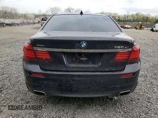 2014 BMW 7 Series ALPINA B7 xDrive with VIN WBAYF8C51ED652985, listed as a Copart auction lot 54299625 with 80,577 mi miles and Salvage Title. Bid and sale history available at DreamBid. Image 6.