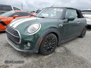 2019 MINI Convertible Cooper with VIN WMWWG5C55K3F79689, listed as a Copart auction lot 74001384 with 0 mi miles and Salvage Title. Bid and sale history available at carsss.com. Image 1.