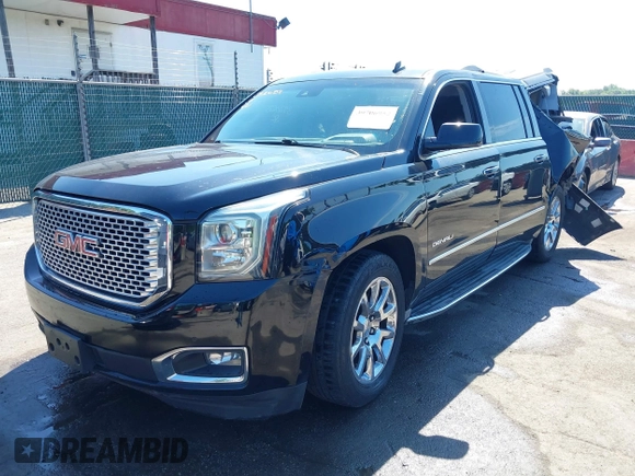 2015 GMC Yukon XL Denali with VIN 1GKS2JKJ9FR244754, listed as a IAAI auction lot 39706952 with 94,917 mi miles. Bid and sale history available at carsss.com. Image 2.