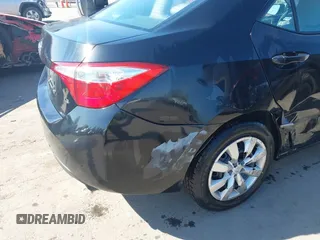 2015 Toyota Corolla L z VIN 2T1BURHE3FC271909, wystawiony jako IAAI lot #41898712 z przebiegiem 142 987 mil mil oraz . Historia ofert i sprzedaży dostępna na DreamBid. Obrazek 17.