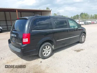 2010 Chrysler Town & Country Touring with VIN 2A4RR5DX5AR329523, listed as a IAAI auction lot 41941874 with 207,079 mi miles. Bid and sale history available at carsss.com. Image 4.