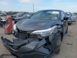 2021 Toyota C-HR LE with VIN JTNKHMBX9M1118773, listed as a IAAI auction lot 41115157 with 57,289 mi miles. Bid and sale history available at carsss.com. Image 2.