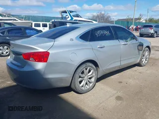 2018 Chevrolet Impala LT with VIN 1G1105SA6JU137163, listed as a IAAI auction lot 41974788 with 108,388 mi miles and . Bid and sale history available at DreamBid. Image 4.