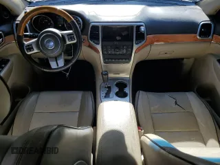 2011 Jeep Grand Cherokee Overland with VIN 1J4RR6GT8BC606688, listed as a Copart auction lot 57182295 with 100,423 mi miles and Salvage title. Bid and sale history available at DreamBid. Image 8.