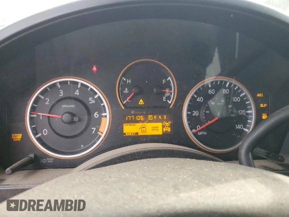 2011 Nissan Titan S z VIN 1N6AA0CJ7BN322207, wystawiony jako Copart lot #77558164 z przebiegiem 177 105 mil mil oraz Szkoda całkowita • Salvage title. Historia ofert i sprzedaży dostępna na DreamBid. Obrazek 9.