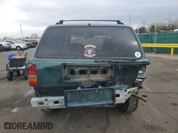 1996 Jeep Grand Cherokee Laredo with VIN 1J4GZ58S6TC165636, listed as a Copart auction lot 51485235 with 266,873 mi miles and Salvage Title. Bid and sale history available at carsss.com. Image 6.
