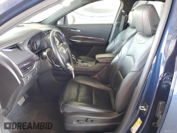 2022 Cadillac XT4 FWD Luxury с VIN 1GYAZAR40NF120224, выставлен на аукционе Copart как лот 61100285 с пробегом 35 260 миль миль и Списание • Salvage title. История ставок и продаж доступна на DreamBid. Изображение 7.
