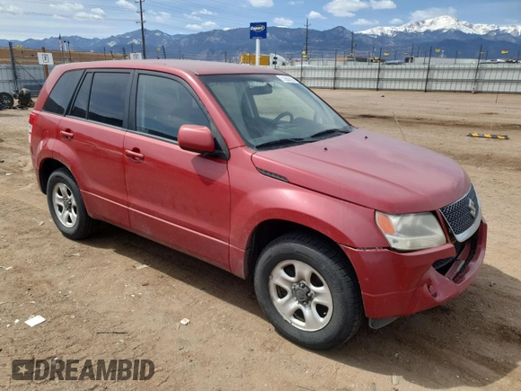 2012 Suzuki Grand Vitara Premium z VIN JS3TD0D20C4101342, wystawiony jako Copart lot #51956595 z przebiegiem 166 710 mil mil oraz Szkody całkowita. Historia ofert i sprzedaży dostępna na DreamBid. Obrazek 4.