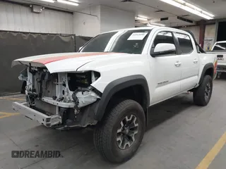 2022 Toyota Tacoma SR with VIN 3TMCZ5AN5NM480311, listed as a IAAI auction lot 42542600 with 43,297 mi miles and . Bid and sale history available at DreamBid. Image 18.