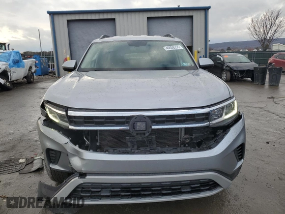 2021 Volkswagen Atlas SE z VIN 1V2LP2CAXMC513803, wystawiony jako Copart lot #46808555 z przebiegiem 99 909 mil mil oraz Szkody całkowita. Historia ofert i sprzedaży dostępna na DreamBid. Obrazek 5.